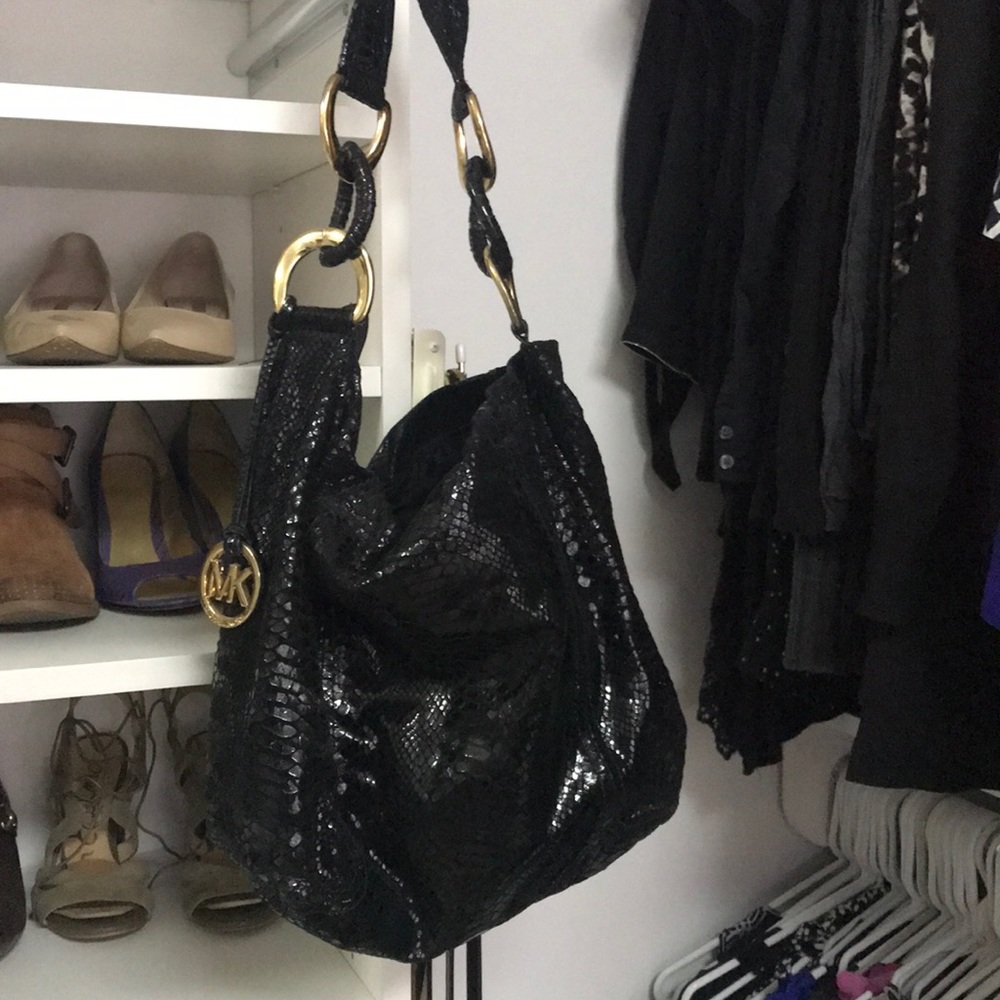 Bohemian reptile-like bag.  Great for going out.